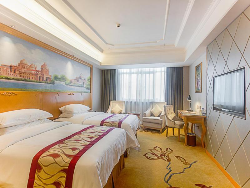 Vienna International Hotel Haikou West Bus Station Bagian luar foto